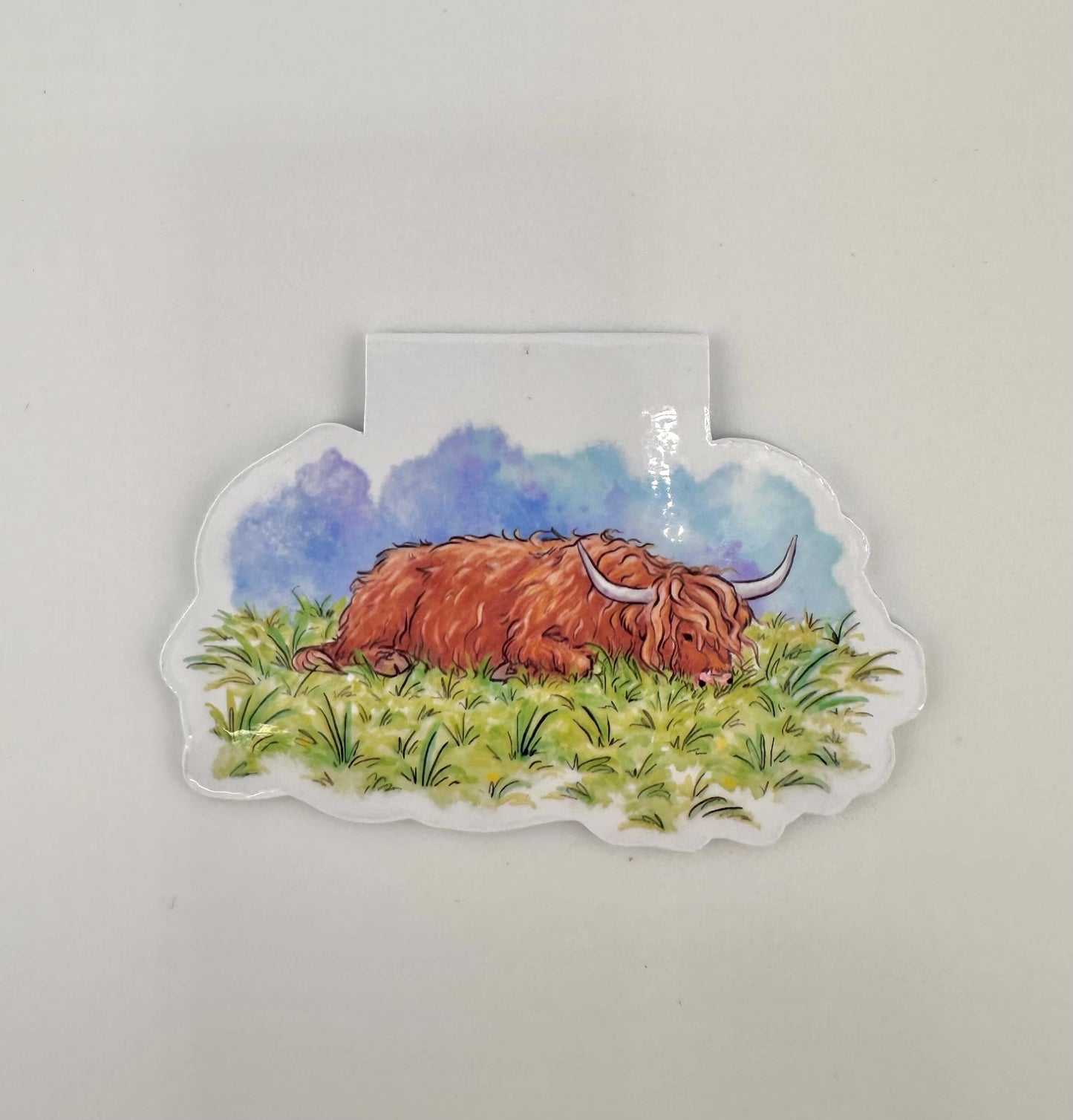 Sleeping highland cow magnetic bookmark