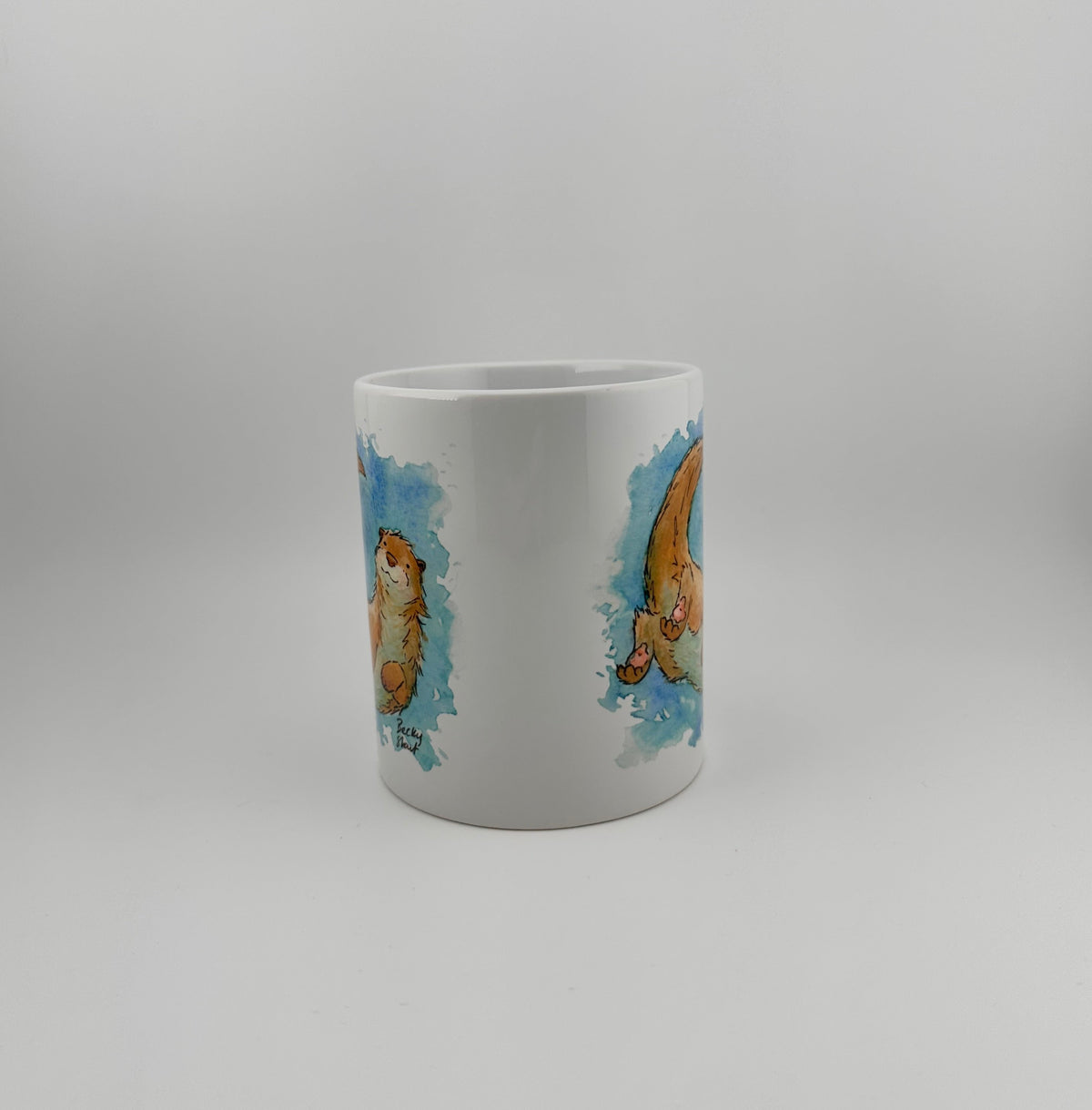 Otter mugs and coasters