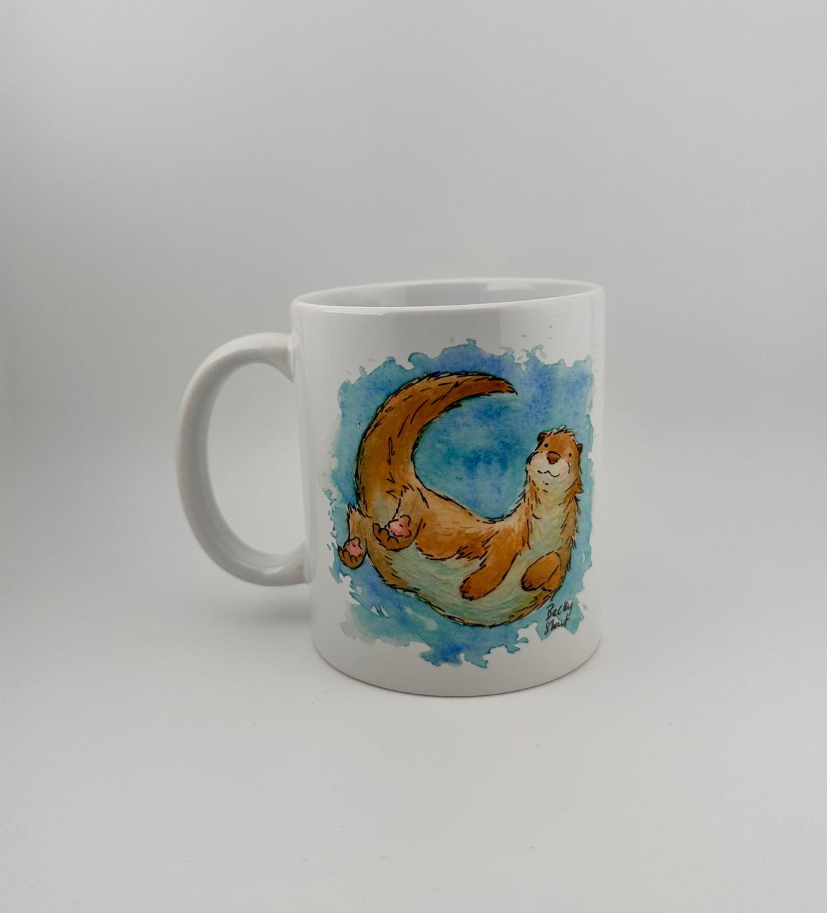 Otter mugs and coasters